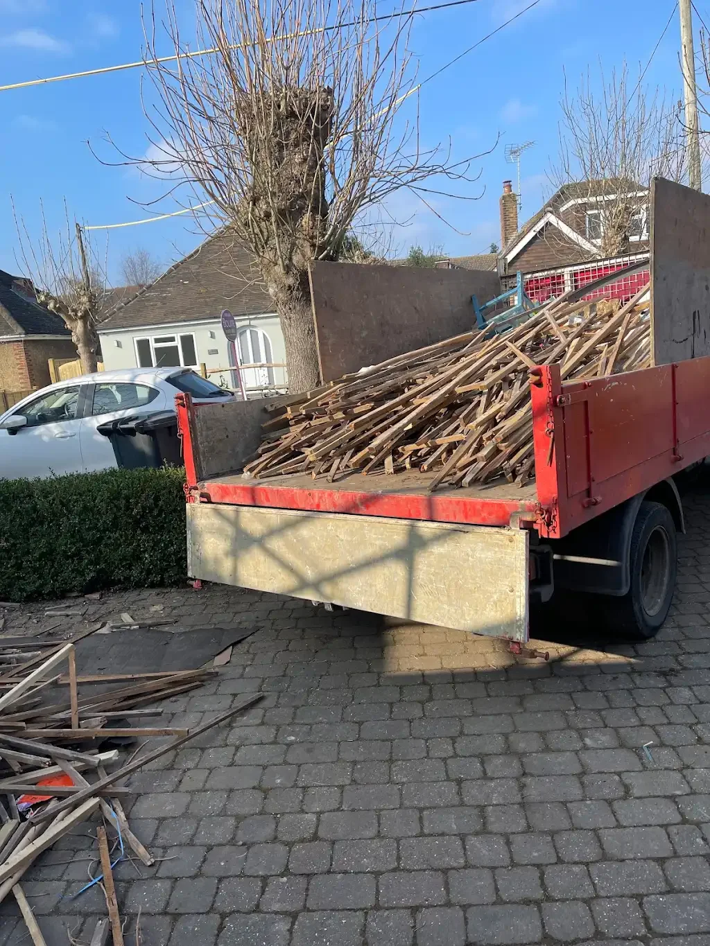 Half truck load — garden waste and tools cleared by Mr. Tippy
